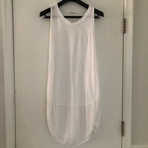 Simple, free-flowing white bell dress